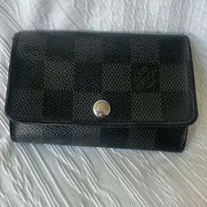 Authentic Louis Vuitton Gray Ebene Leather Key
Holder Wallet